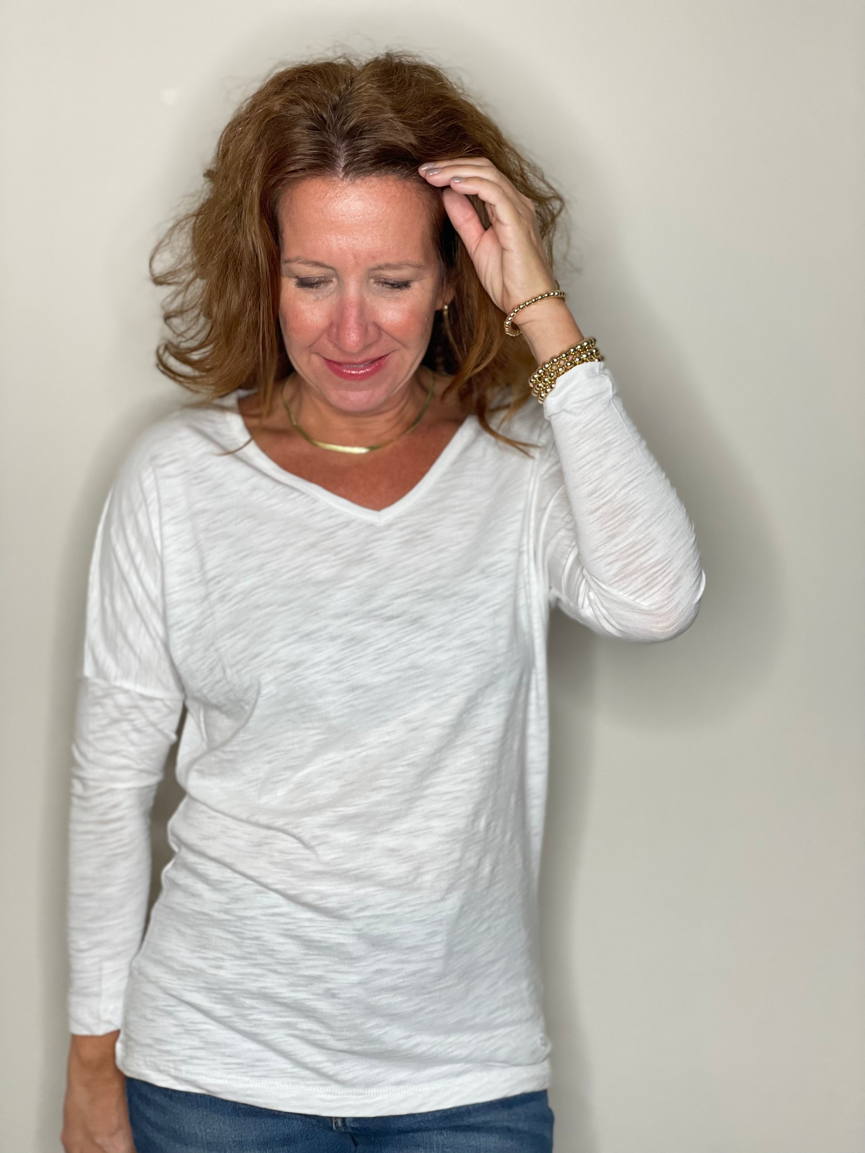 Erin Gray 3/4 Sleeve Dolman V Neck in White.