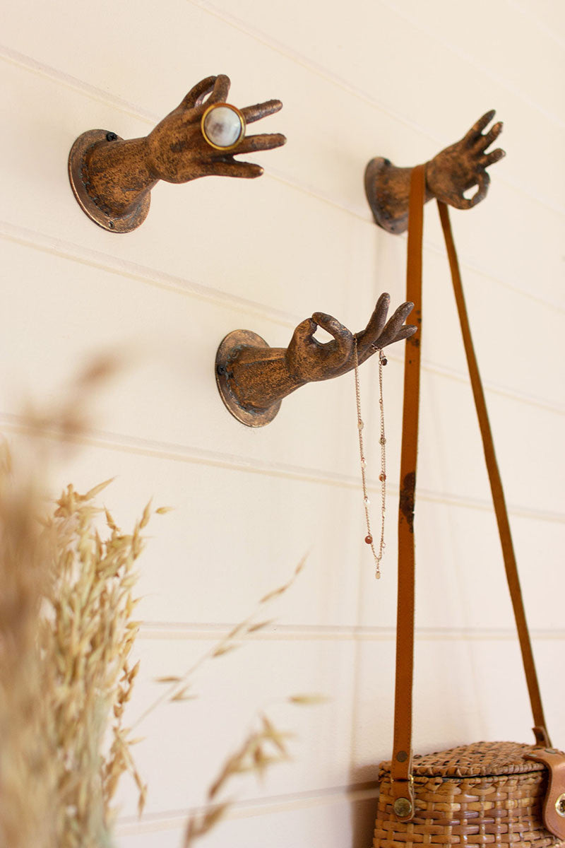 Antique Brass Hand Wall Sconce.