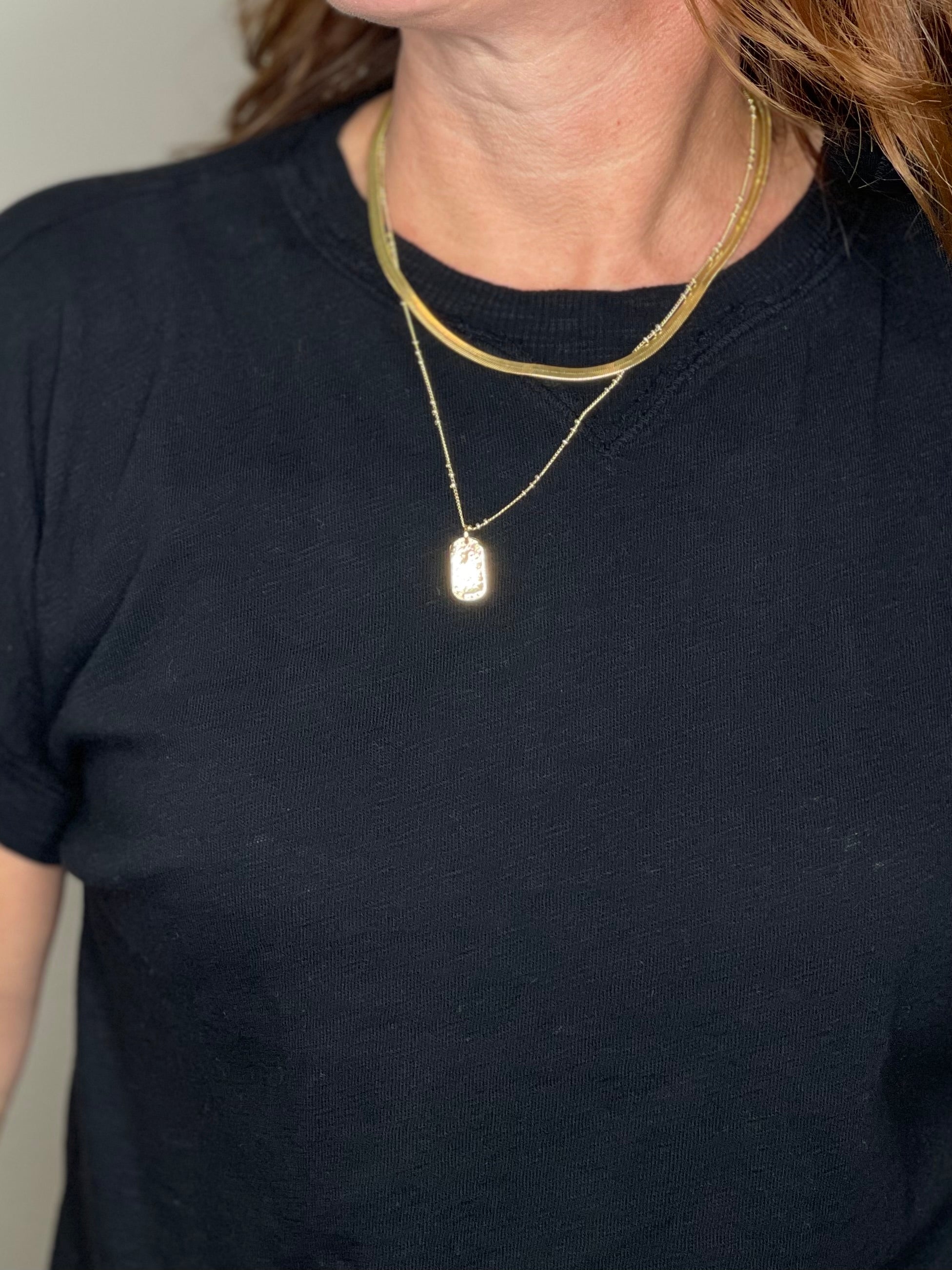 Notch Neck Tee in White & Black.