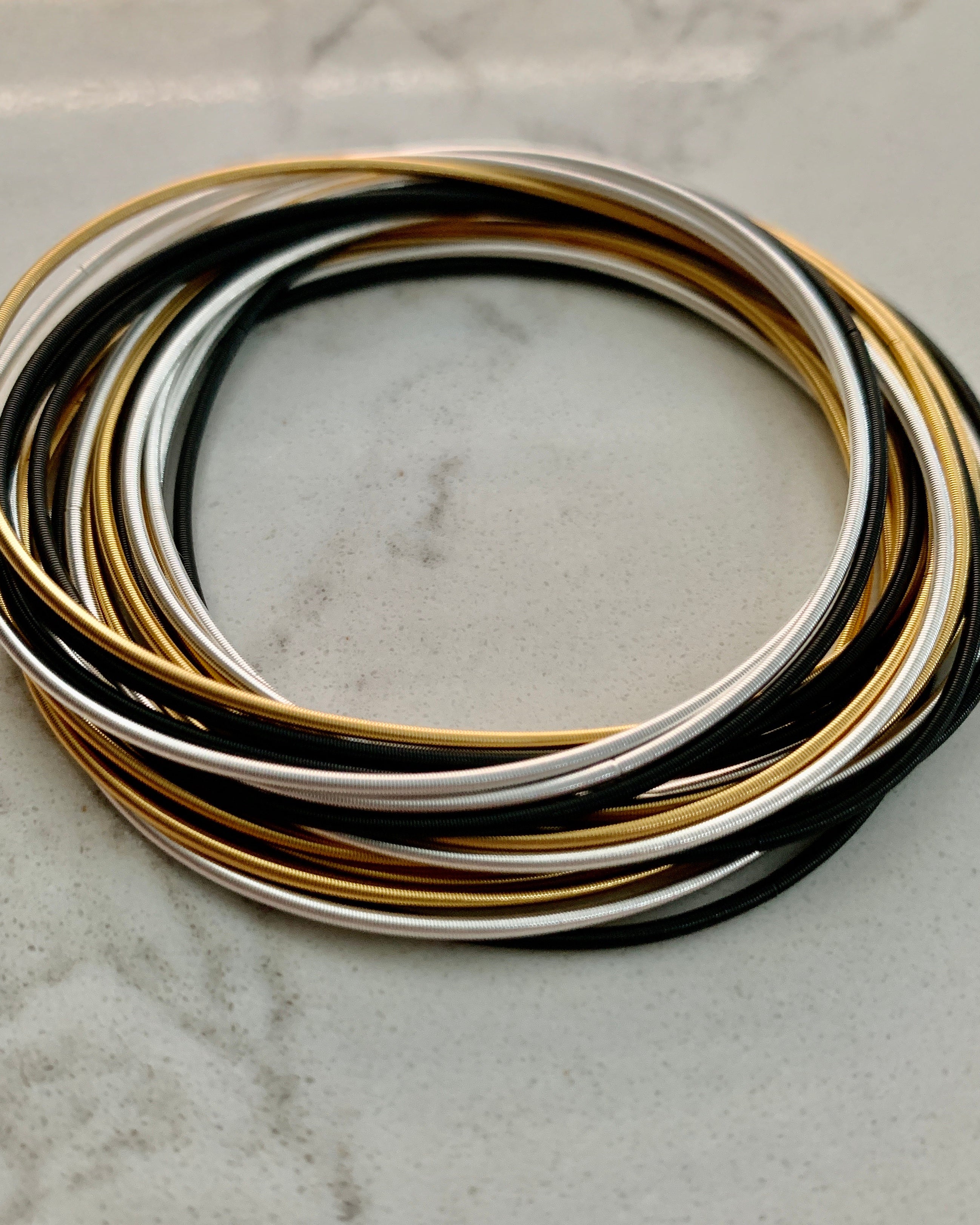 Stainless Steel Tri-Mix Plated Guitar String Bracelets - Set of 20.