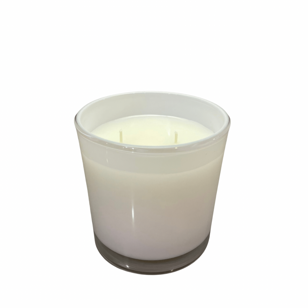 Candle in White Glass.