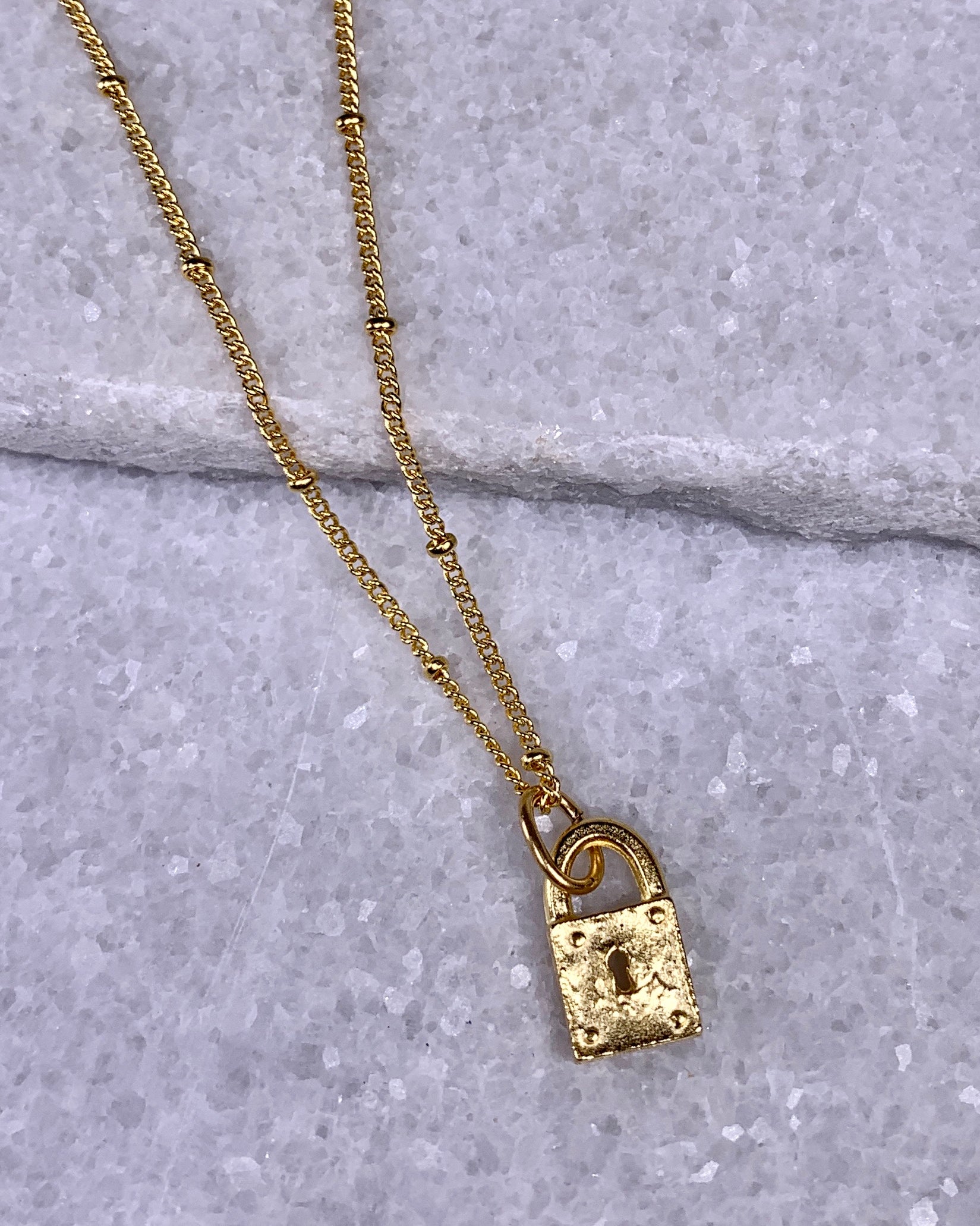 Susan Shaw Tiny Gold Lock Necklace.