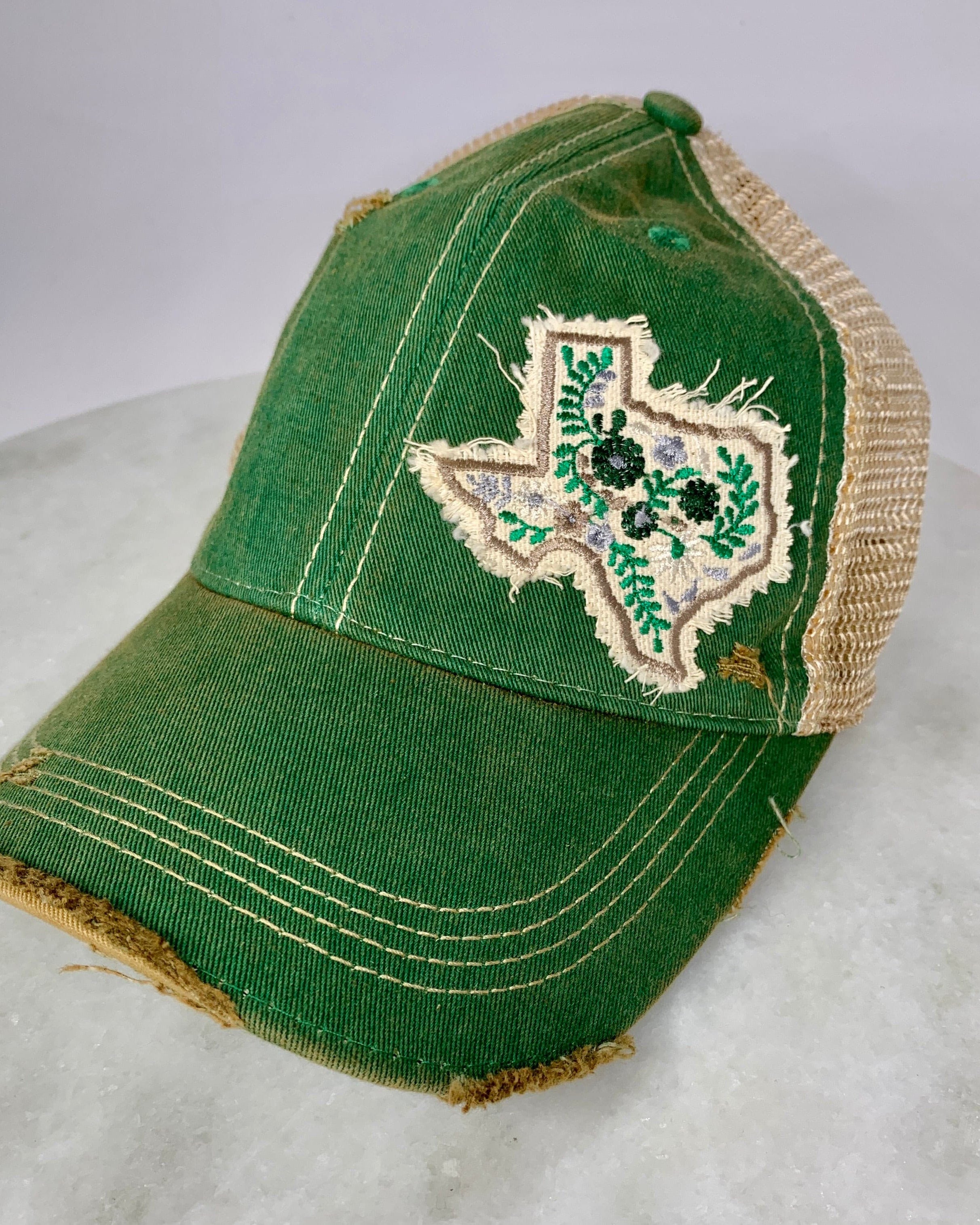 Assorted Texas Shape Patch Trucker Hats.