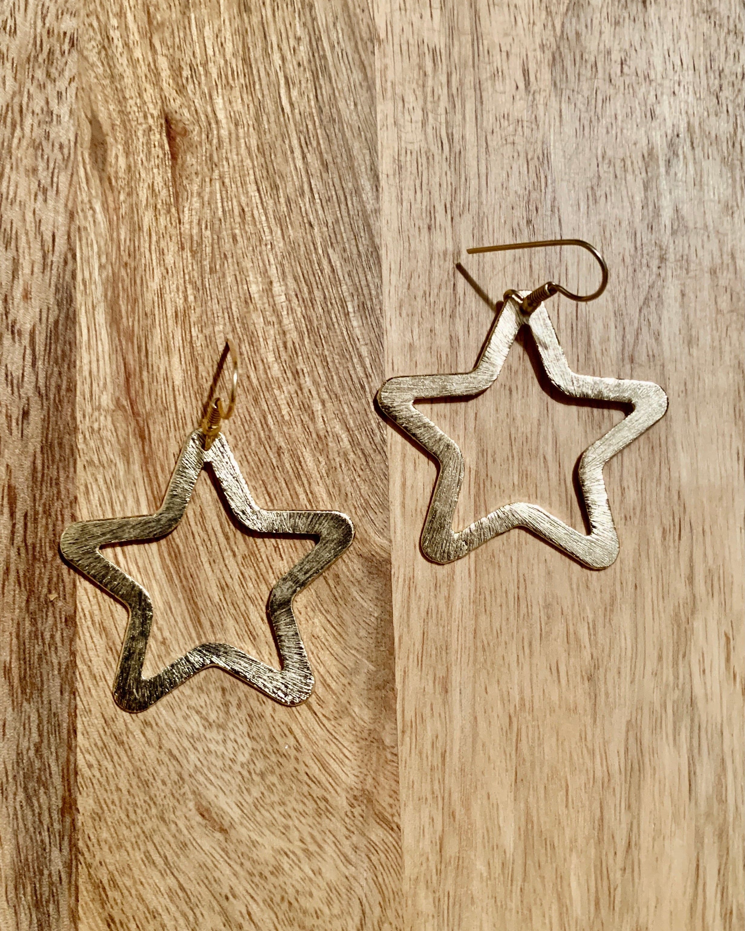 Large Brushed Gold Star Earrings.