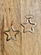 Large Brushed Gold Star Earrings.