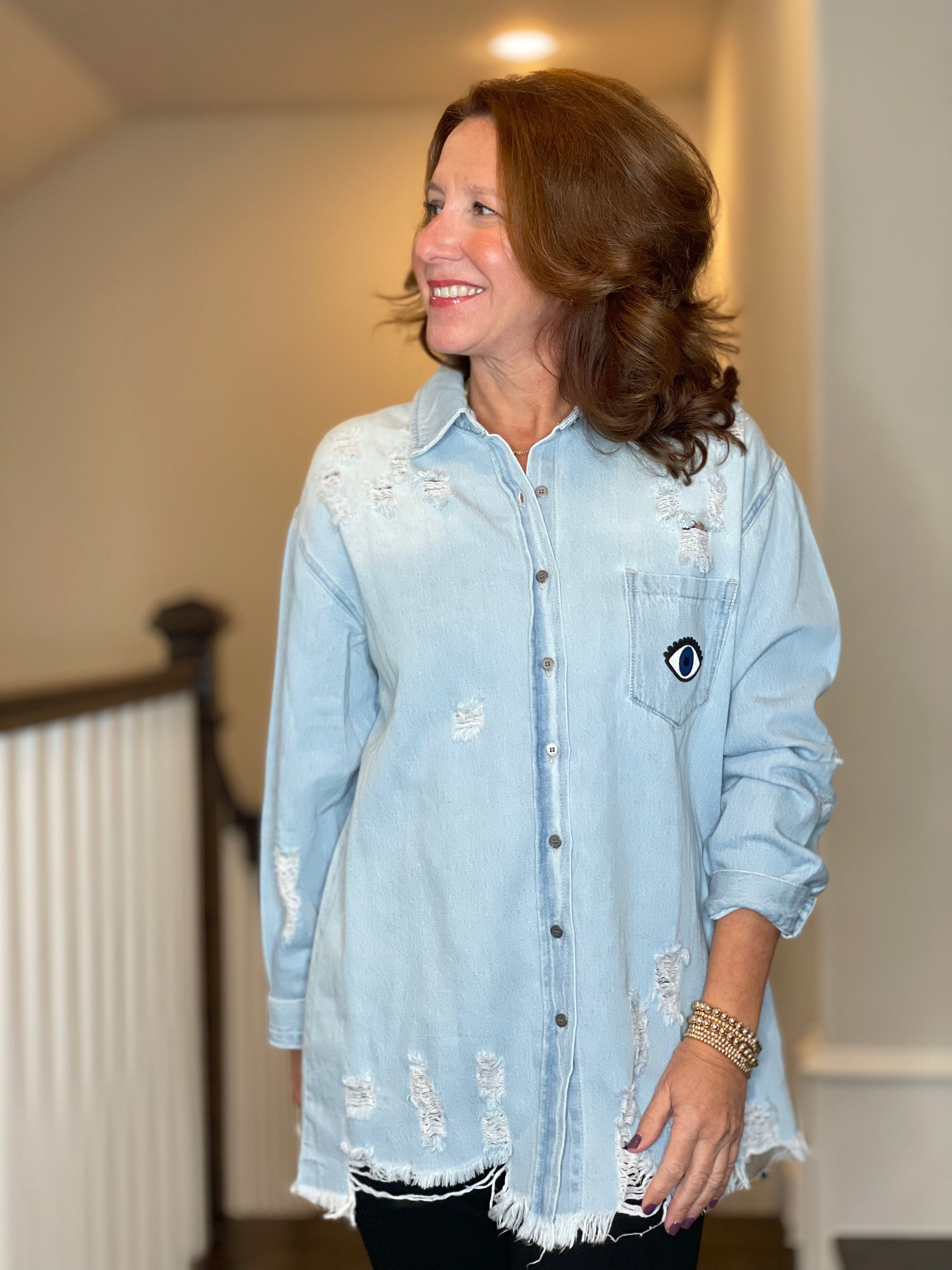 Distressed Denim Shacket with Evil Eye Heart Embellishment.