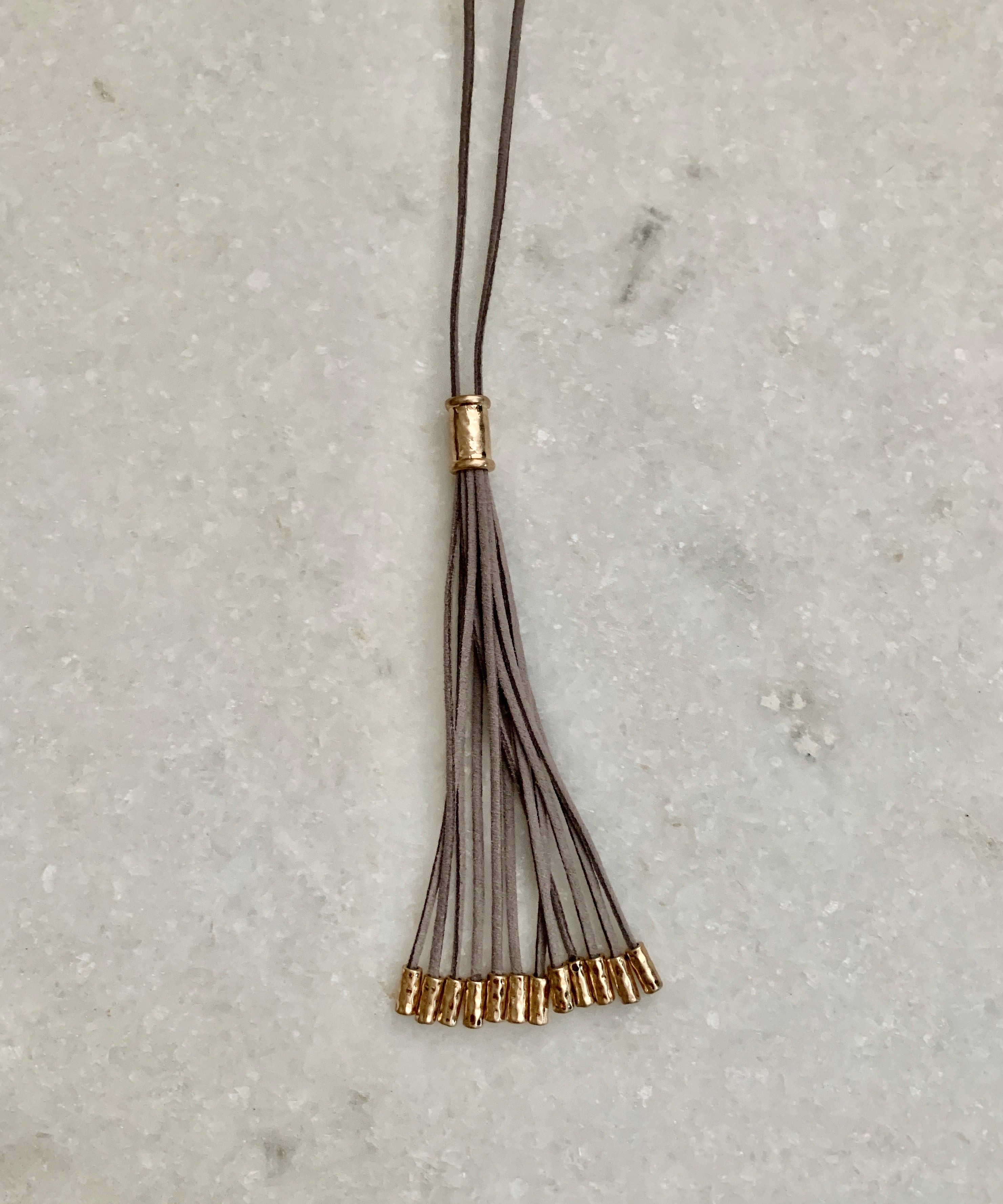 Long Suede Tassel Necklace w/Metal Tips.
